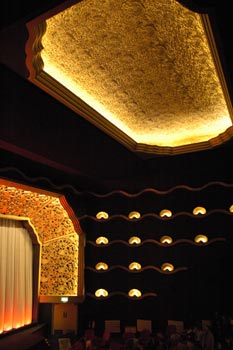 the golden domed ceiling lit-up around its edge